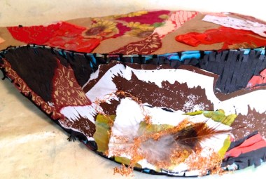 small paper boat sculpture